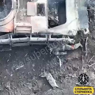 Russian soldier gets head blown off by Ukrainian drone drop