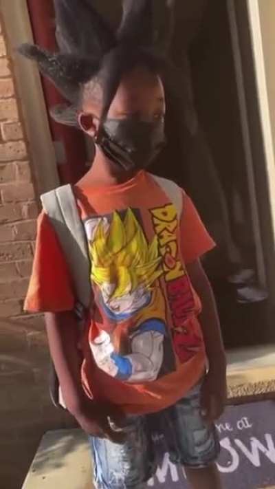 This guys goku hairstyle done by his mom