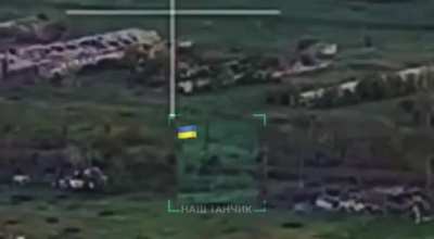 UA Drone View Of An Armored Clash Between a Ukrainian Tank And Russian Vehicles.