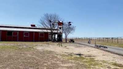 Parent of the year award goes to the dad flying his kid on a giant drone