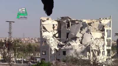 FSA using an improvised cannon to batter what remains of a Syrian Army strongpoint - al-Rashideen, Aleppo - 5/6/2015