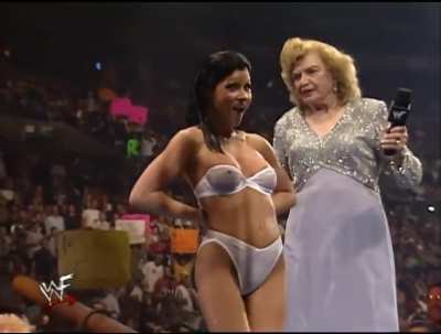 Miss Kitty/The Kat Removing Her Bra and Flashing Her Breasts at "WWF Armageddon 1999", National Car Rental Center, Sunrise, FL, December 12, 1999 (Guilty pleasure)