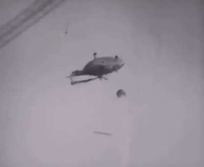 A Mi-8 Helicopter crashes over the core of the Chernobyl reactor in October in 1986