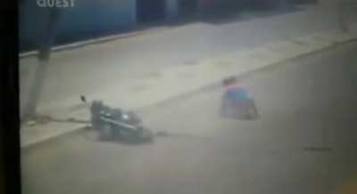 Man crashes bike, bike hits pole, pole lands on man's head.