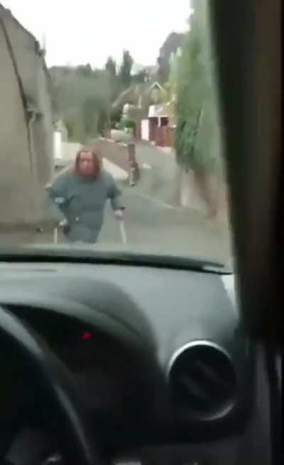 Shouting match between an angry driver and a slow woman