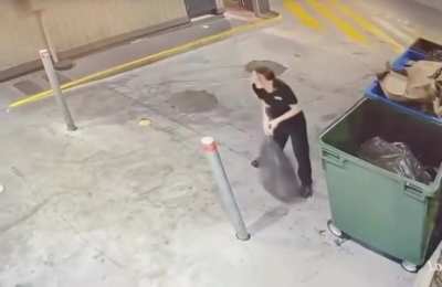 Trying to throw out the trash