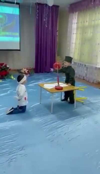 Nothing unusual, just for the 30th anniversary of Kazakhstan's independence, kids in kindergarten are playing a scene of interrogation and execution by Soviet soldiers of a proud Kazakh student. Apparently, the modern interpretation of the "December upris