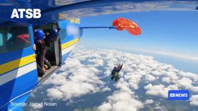Skydiver left dangling from plane after parachute got tangled