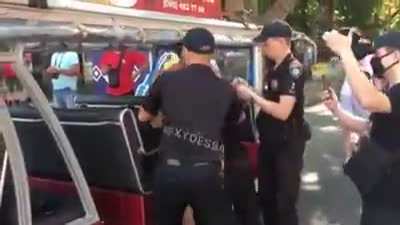 American guy being detained for wearing Russian flag t-shirt in Odessa, Ukraine