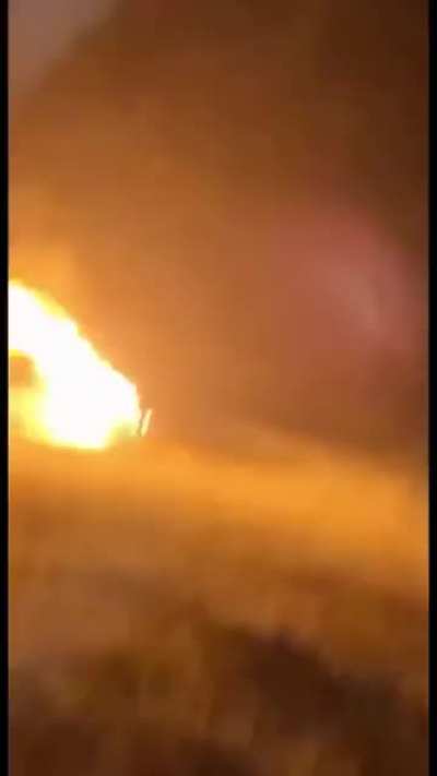 A propane tank flying through the night.