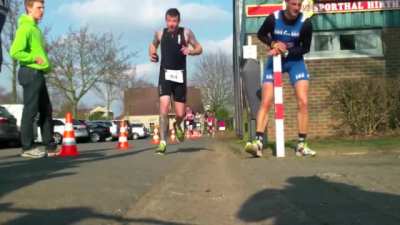 Runner Smashes Nuts Into Pole GIF
