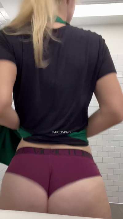 Big ass barista in uniform ready for shift