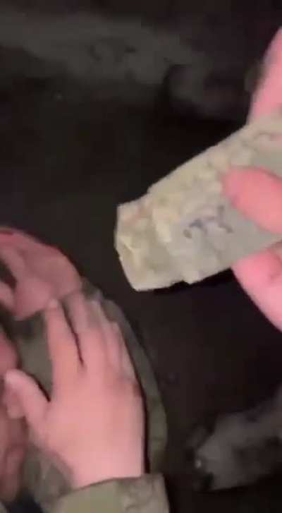 A Russian who had his rank striped from him and threaten with death to shout "Glory to Ukraine"