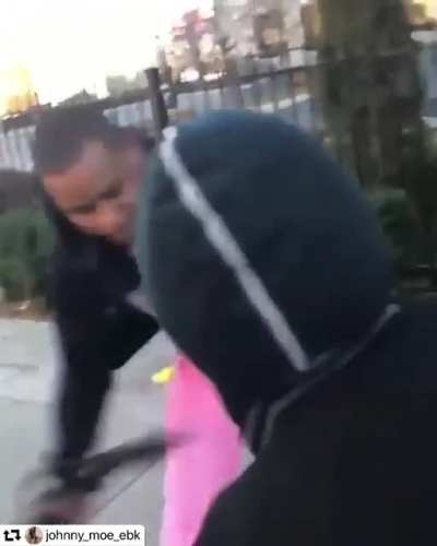Johnny Moe posted @_ninos_design (IG) whoopin an opp with a belt. “You Die Boc or what?”