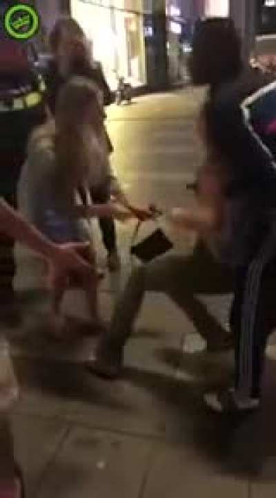 woman got beaten up real bad out in public