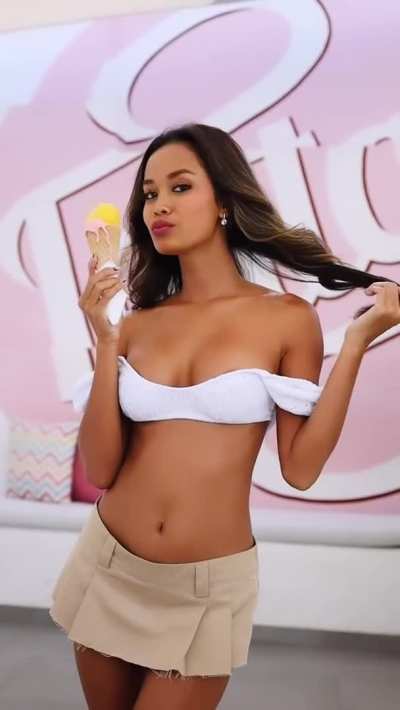 Eating her ice cream