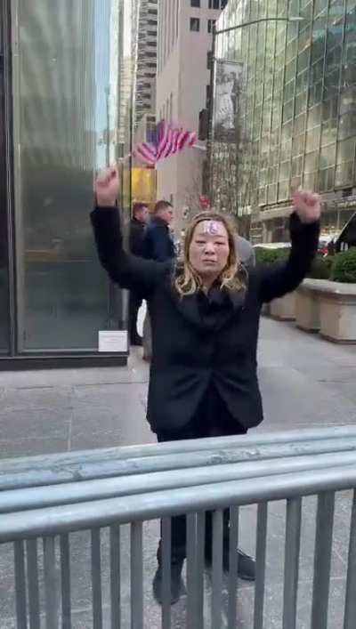Trumps Paladins Stand Outside His NYC Tower Shouting Praise to Him