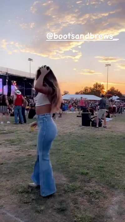 in jeans at Boots &amp;amp; Brews