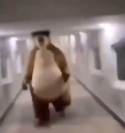 Me running to deposit the money bags after the guards spot the minigun in my back pocket