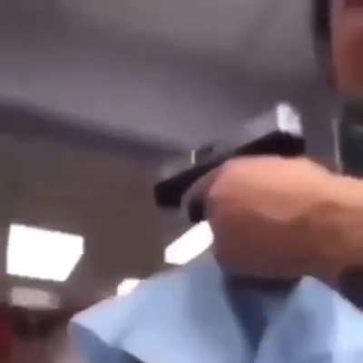 An unhinged man escaping a hospital armed with a gun