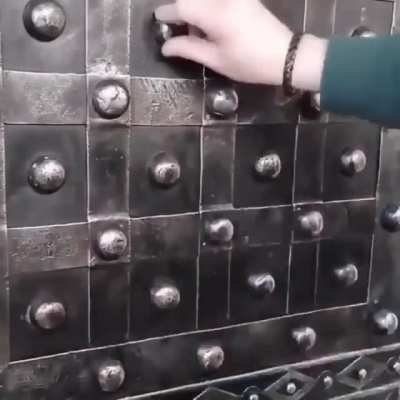 Opening an antique safe made in France in the late 1700s.