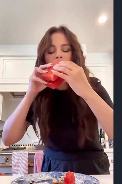 Selena eating a watermelon sandwich&hellip;