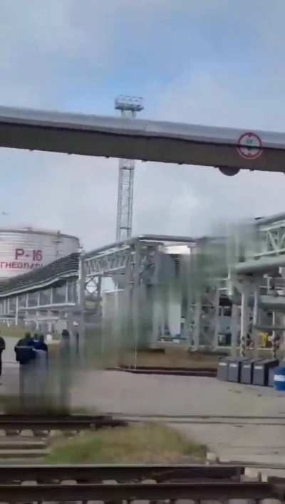 Footage of a Ukrainian E-300 "Enterprise" drone attacking a Russian refinery in Taman. Small arms fire is heard while the drone is on its final approach.