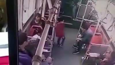 Kid gets beaten up for annoying a man by putting up his shoes to the man's clothes.