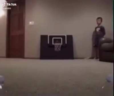 Water bottle flip basket ball trickshot