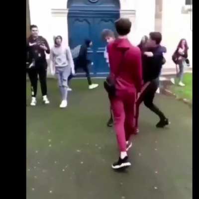 dumb kid fires his gun in the air while hes friend is fighting