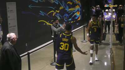 [Highlight] Steph Curry waits for Poole in the tunnel after his game winning layup and Poole sarcastically throws his mouth piece