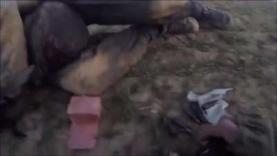[GRAPHIC] Daesh Militant Casually Uses Dying Comrade as Body Shield While Reloading During Heavy Firefight with (Syrian/Iraqi?) Forces