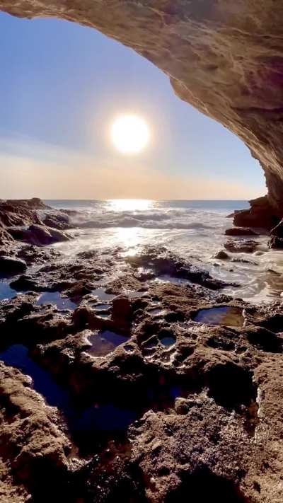 Laguna Beach, waves in the caves at sunset