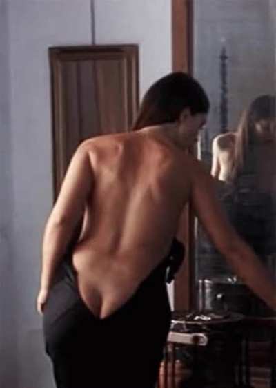 Monica getting dressed.
