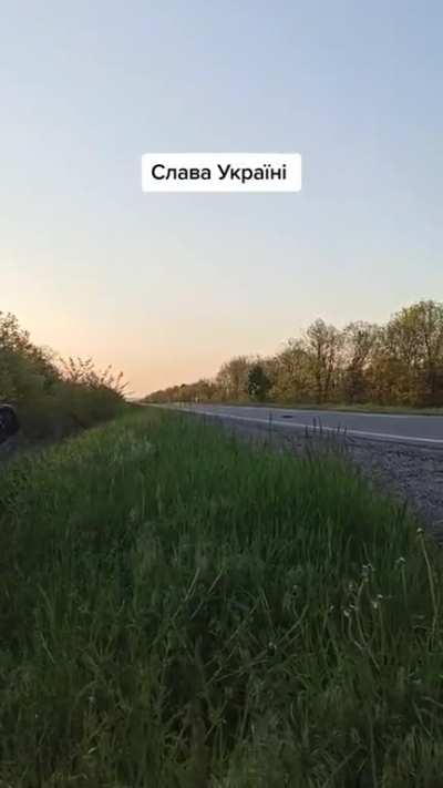 Ukrainian soldiers sneak up then attempt to hit a unknown Russian vehicle with a NLAW