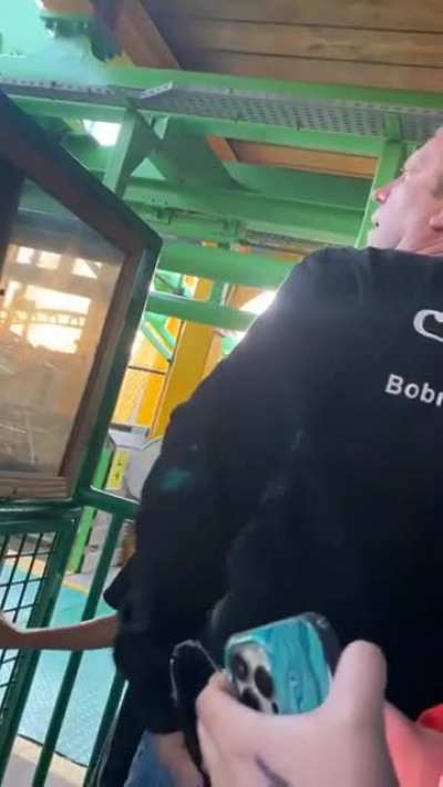 A father freaking out because his daughter has to wait in line.