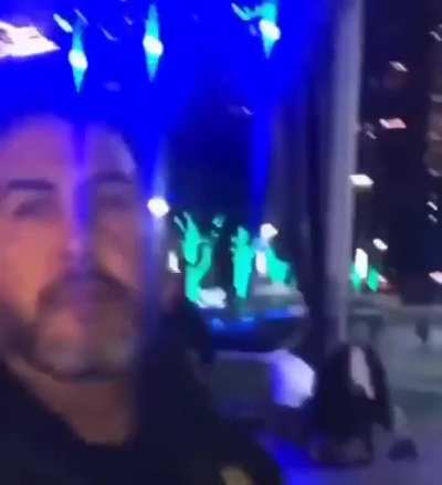 Hispanic man shakes Beto's hand and then tells him off