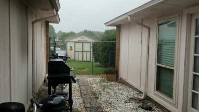 Love the sound of rain on our outdoor rug.