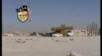 Liwa al-Islam 9M113 Konkurs team uses water to minimize their dust profile before engaging a Syrian tank - Qalamoun - 9/2/2013