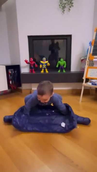 This little kid and his little jacket trick