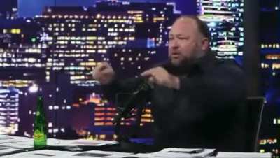 Alex Jones Gobbles Ivermectin On Air