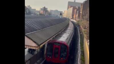 The reason the district and Piccadilly line has been fucked all day. He&rsquo;s still on the roof apparently and he got up there around 2.15ish