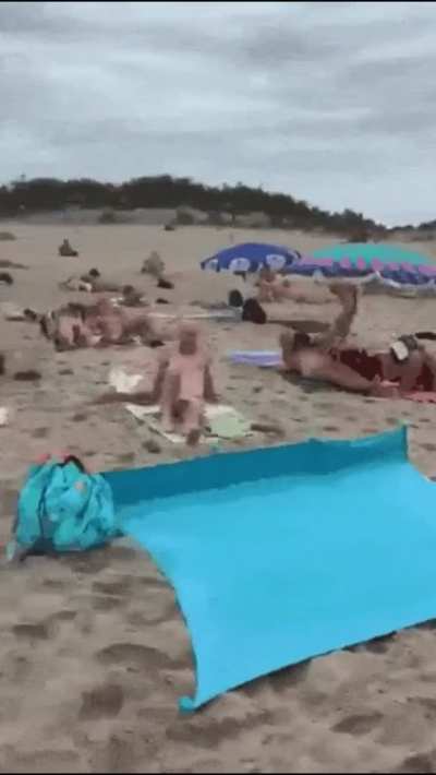 Blowjob on a Public Beach