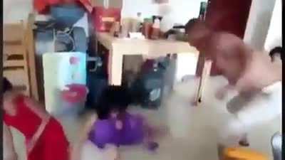 Chinese man beating up 3 young Uyghur girls who are forced to live with him by the government in attempt to become more "civilised". They are taken from their parents and most end up being raped and beat.