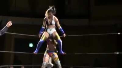 Asuka Stinkfaced by Hikaru Shida.
