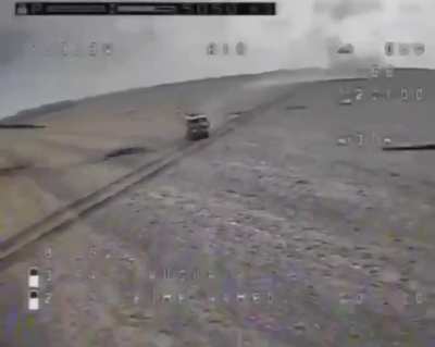 Russian assault buggy riding through an empty field is hit by three consecutive drone strikes
