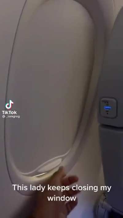 Closing a window seat window that isn&rsquo;t yours.