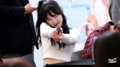 Nayeon shoots at you