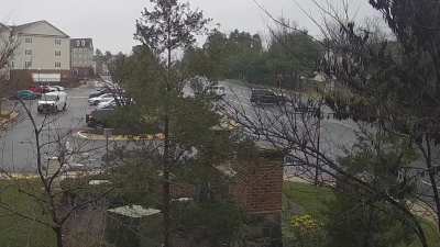 SUV Idiot wrecks head-on after left turn on wet road. Both Drivers taken away in ambulances. Lost control I guess.
