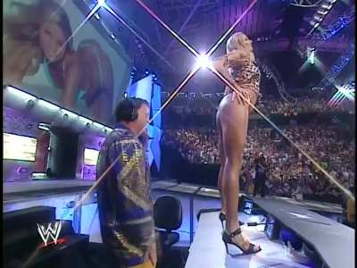 Stacy dances on announce table 8-12-02 IG